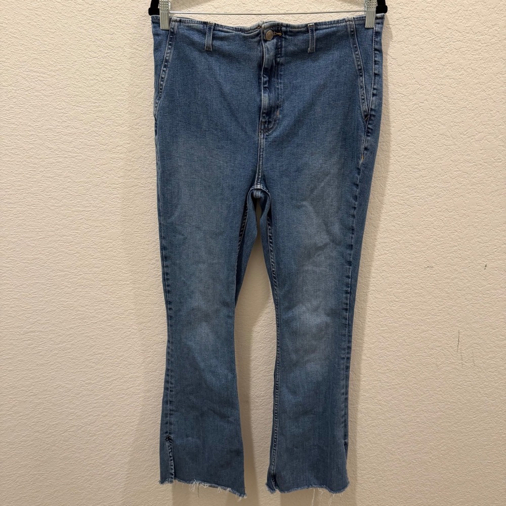 We The Free Free People High Rise Flare Jeans Blue Medium Wash Raw Hem Size 33